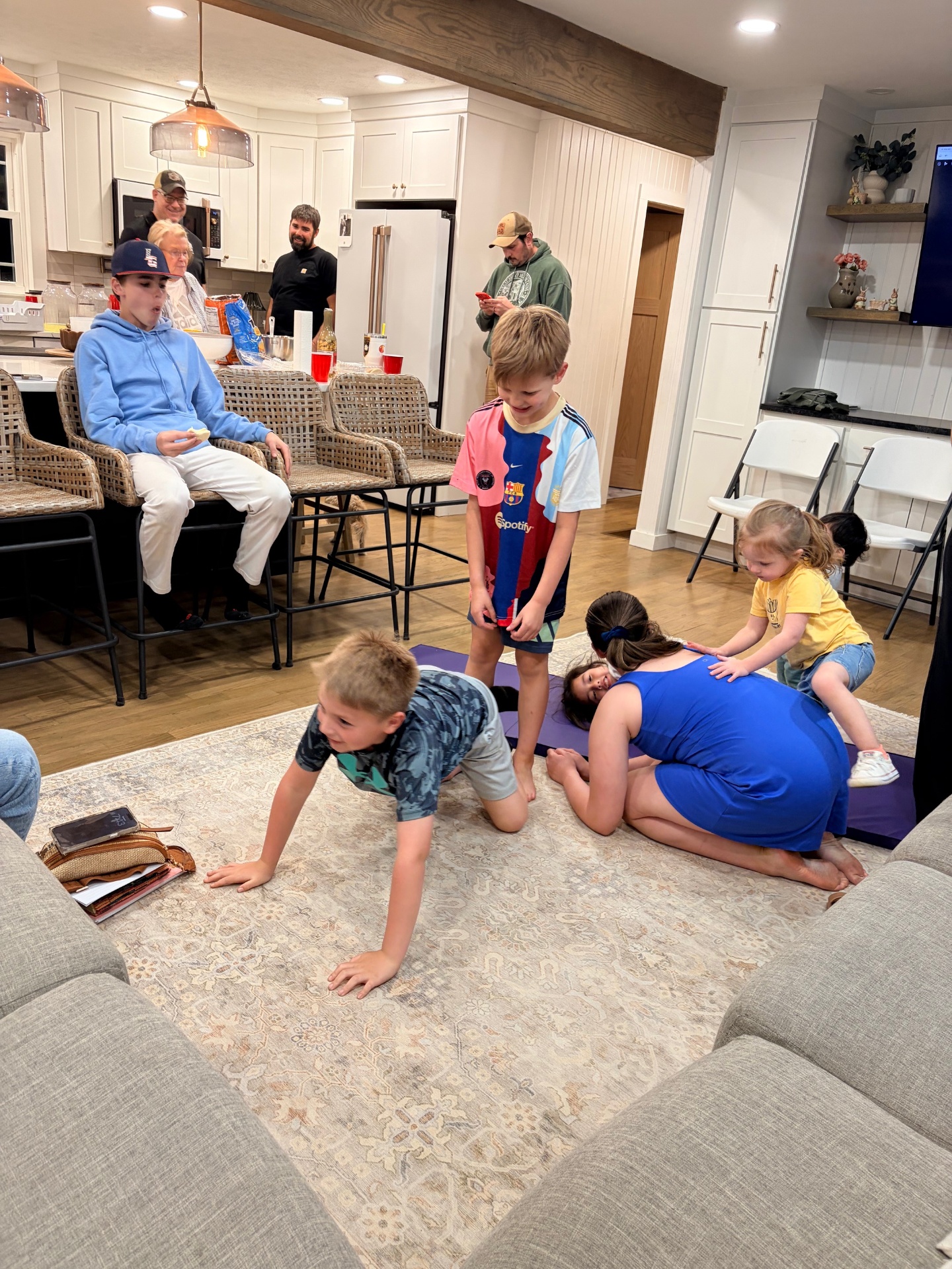 Kids playing while the adults gather